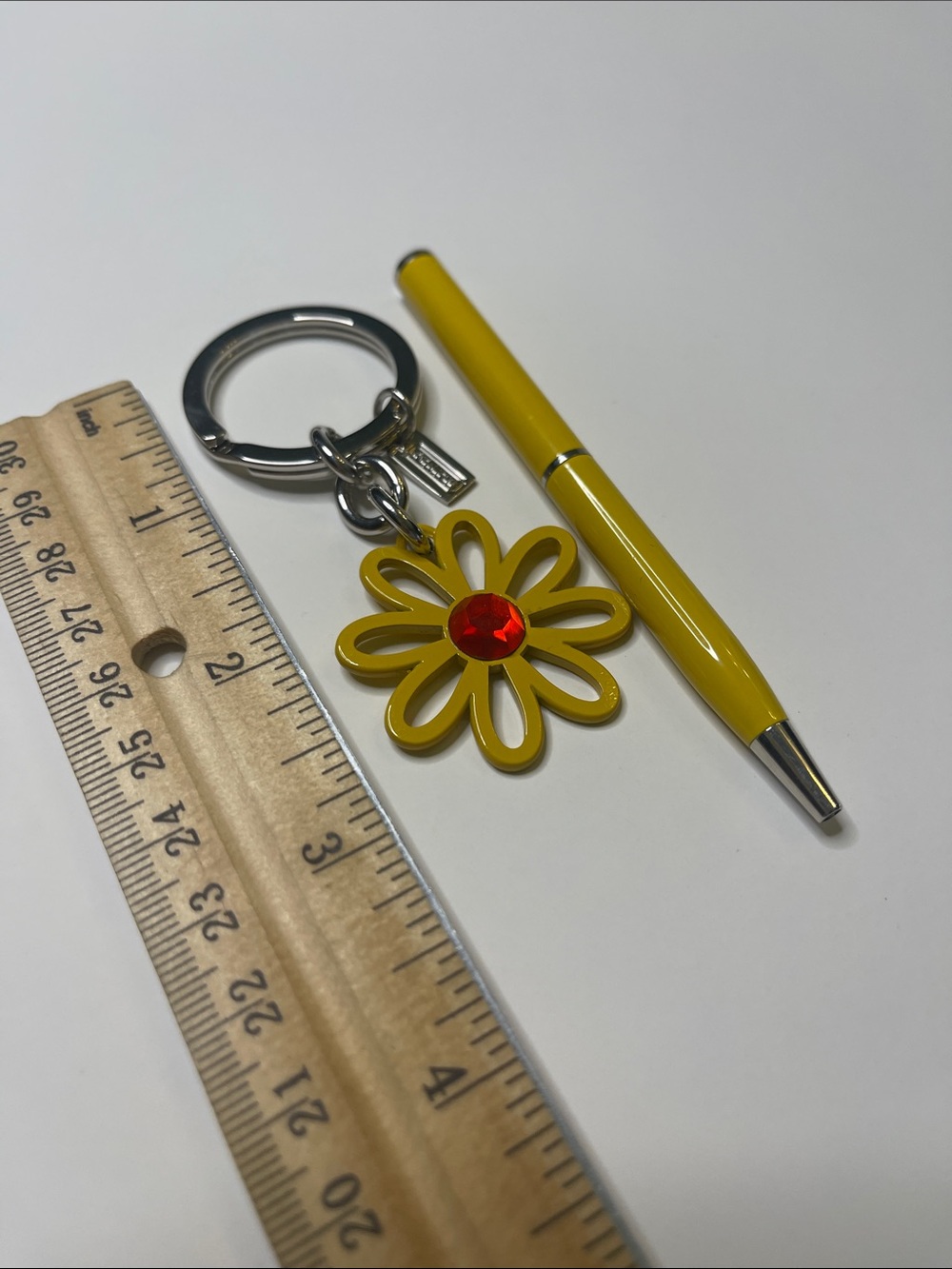 Coach Yellow Daisy Keychain with Red Center and Yellow Coach Pen - Picture 5 of 8